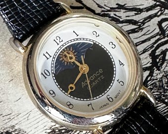 Advance Moon Phase Watch - 90s Moonphase:  Black Central Dial, New battery, Original Black Leather Band. Blue Gold Sun Moon Day Night Dial.