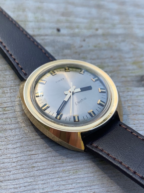 Space Age Timex Pristine Early 70s Pre quartz Electric Watch Large Goldtone W radiant Dial. Excellent Condition With New Leather Strap Etsy Ireland