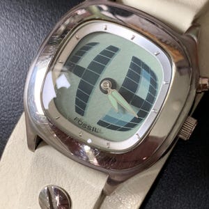 Fossil Big Tic JR-8224 Animated Digital Seconds Watch. Analog Dial