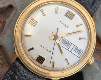1976 Timex Marlin Winder Watch, Goldtone Case w/Champagne Calendar Dial and Mod Digits Decent Overall Condition w/New Leather Band. Works!