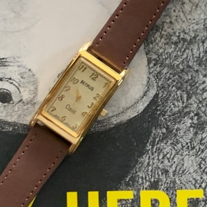 Benrus Curvex Tank Watch 1990s - Benrus Classic Gold Tone Tank Watch - Quartz, Barely worn, New battery, keeps time. Retro Vintage Style.