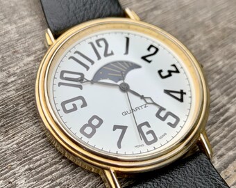 Vintage Quintel Moon Phase Watch: Rotating Celestial Dial  display picture 1