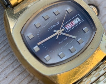 1970s Jublilee Automatic TV Style Watch with Day/Date. Fifty years of loving wear showing here and there. Great crystal, works, keeps time.