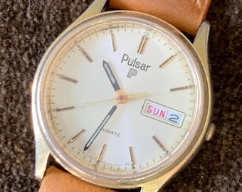 Vintage Pulsar (by Seiko) Quartz Watch - Goldtone w/Gold Dial in Good Condition - 1980s - Day/Date, New  Battery, New Retro Strap. Y148-6019