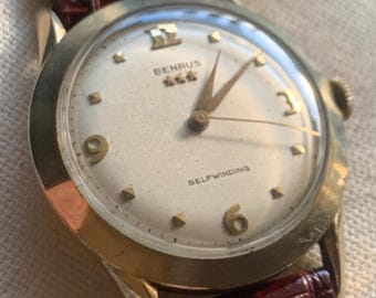Gold Filled Benrus Three Star Self-winding Automatic Watch. 10K Gold Filled. Good working condition. Nice retro numbers, New Leather Strap.