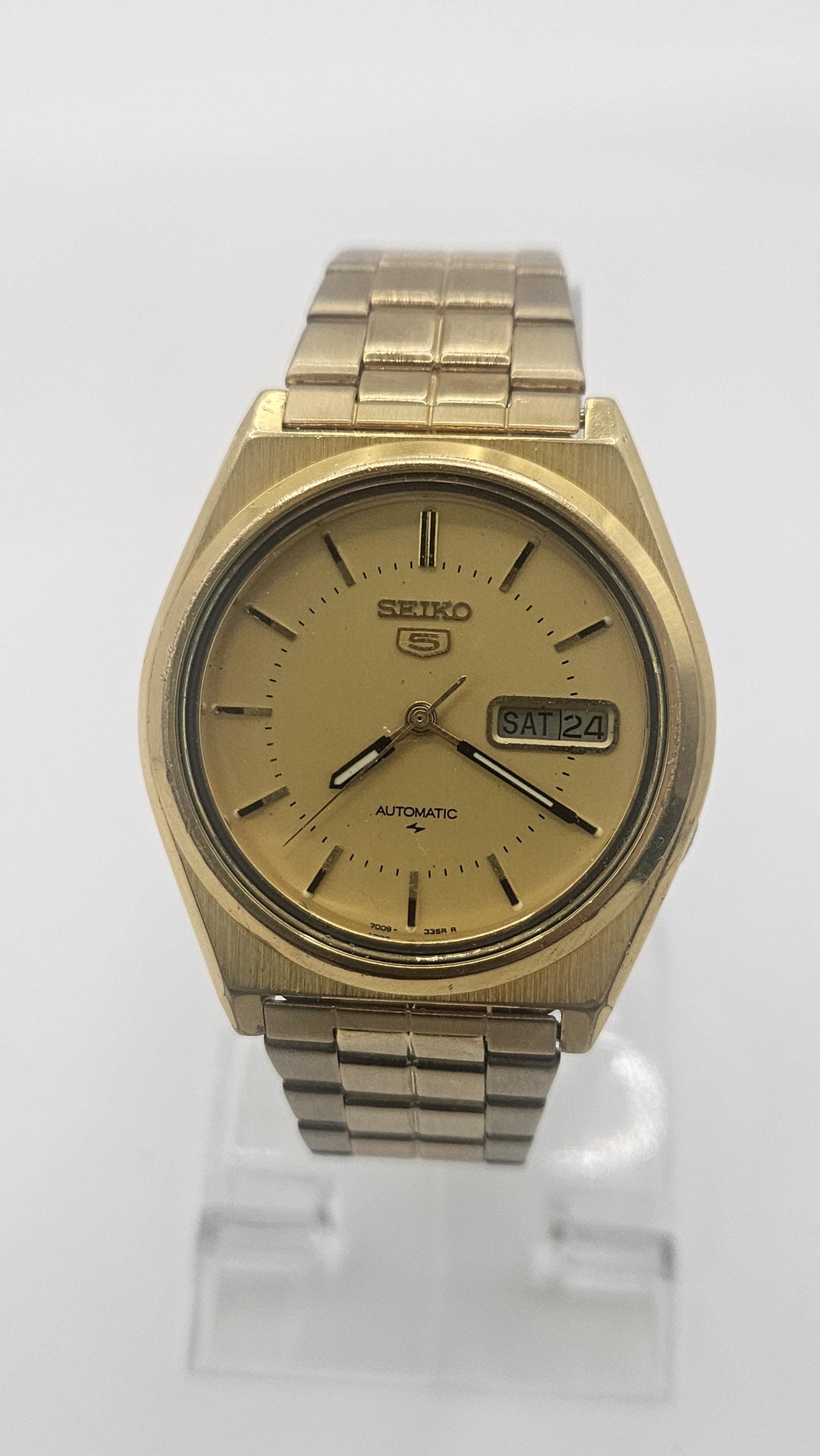 SEIKO クォーツ 時計 1986年製 ゴールド/ブラック Yahoo!オークション -「1986」(さ行) (ブランド腕時計)の落札
