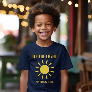 Be The Light Kids Heavy Cotton™ Tee, Christian Tee Shirt for Kids, Children&#39;s Christian Shirt, Shirt for Boys and Girls, Unisex shirt Child
