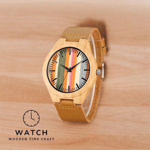 Stylish Fresh Stripes wooden watch with 12-hour display, quartz movement, and a brown genuine leather strap for men. Trendy and eco-friendly timepiece.