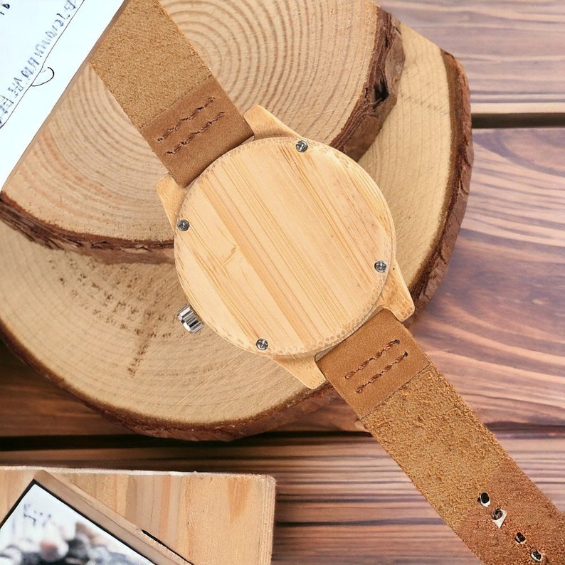 Elegant bamboo wooden ladies bracelet watch with a soft leather band, showcasing a simple yet casual design. Ideal as a gift for women.