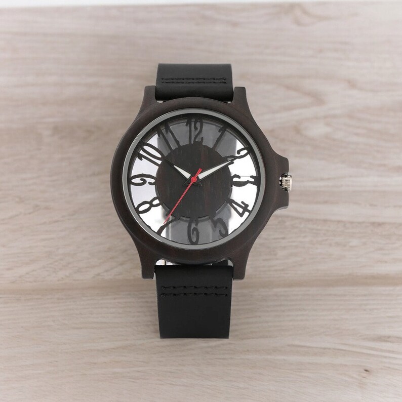 Men chic fashion quartz watch featuring a transparent hollow display with Arabic numerals on a wooden case, complemented by a genuine leather strap.