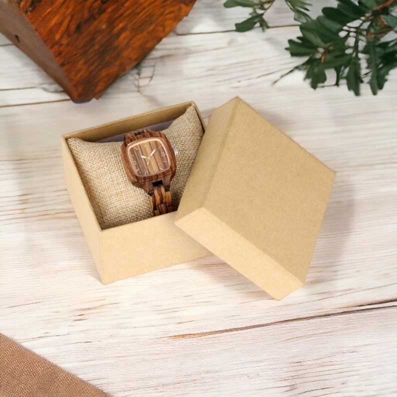 Stylish Zebrawood women watch with a square, analog quartz dial, featuring a natural wooden wristband and a secure push-button hidden clasp, perfect for a chic and eco-friendly accessory.