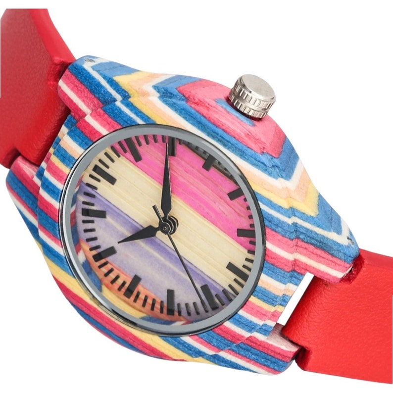 Elegant ladies quartz wristwatch featuring colorful stripes on a bamboo wood face, secured with a pin buckle on a genuine leather watchband. Ideal for casual wear.