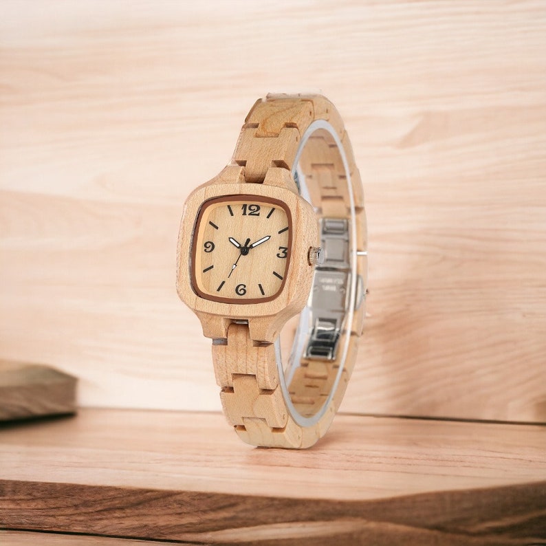 Luxury square-dial maple wood ladies watch with full wooden bangle. Elegant and creative timepiece, perfect as a gift for a girlfriend or wife.