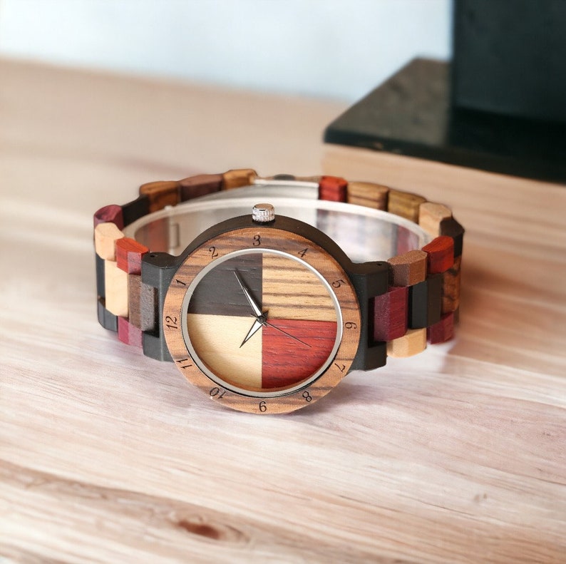 Stylish unisex quartz wristwatch featuring a colorful wood pattern dial and a matching natural wooden bangle band. Ideal for couples. Eco-friendly and fashionable.