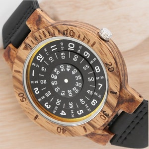 Stylish men quartz wristwatch featuring a unique wooden case and black genuine leather strap, combining modern design with natural elegance.