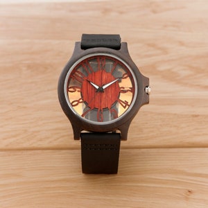 Men chic fashion quartz watch featuring a transparent hollow display with Arabic numerals on a wooden case, complemented by a genuine leather strap.