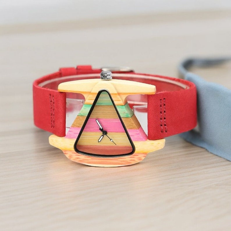 Creative triangular women wooden watch with a colorful dial, accented by green and red genuine leather bands, showcasing elegance and style. Perfect as a top gift choice.