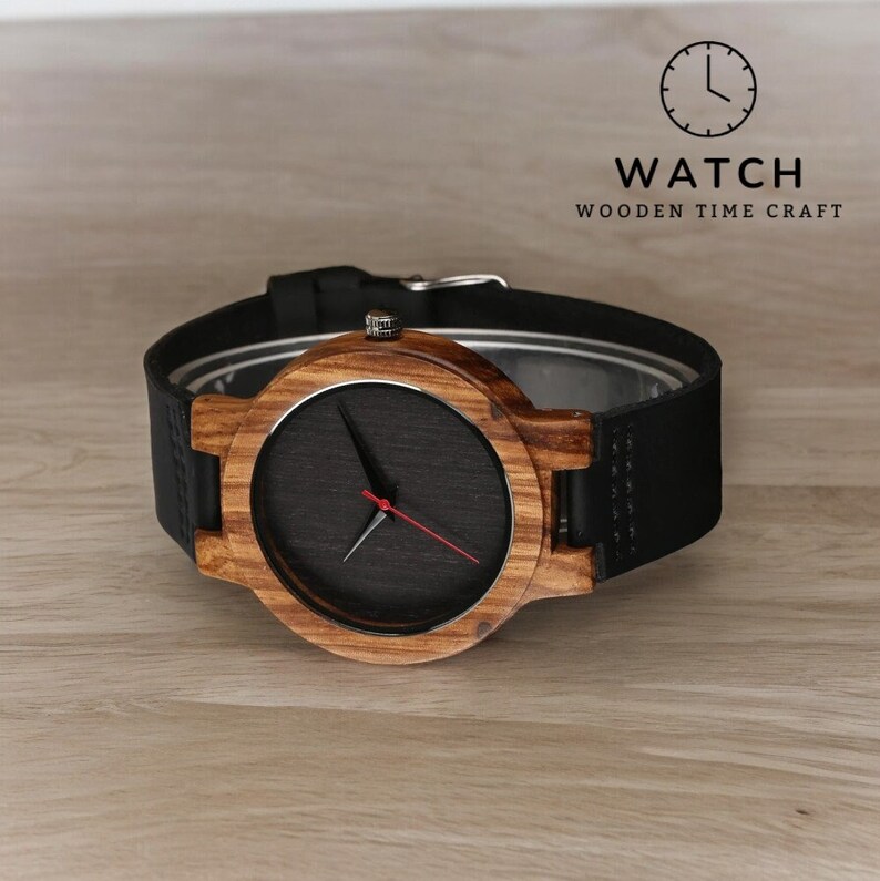 Stylish minimalist wristwatch featuring a wood case with a choice of black, brown, or green dial, complemented by a genuine leather strap. Ideal for both men and women, perfect as a gift.