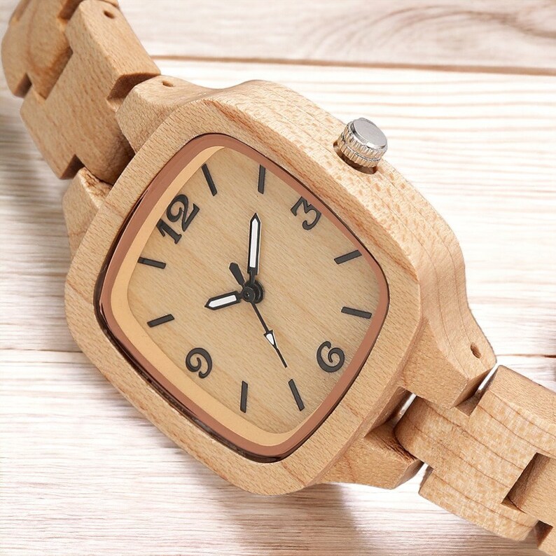 Luxury square-dial maple wood ladies watch with full wooden bangle. Elegant and creative timepiece, perfect as a gift for a girlfriend or wife.