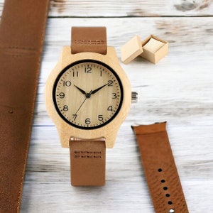 Elegant bamboo wooden ladies bracelet watch with a soft leather band, showcasing a simple yet casual design. Ideal as a gift for women.