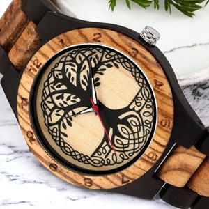 Classic Zebrawood quartz wristwatch for couples featuring a unique life tree pattern on the round dial. Bracelet-style wooden band suitable for both men and women.