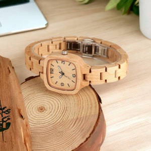 Luxury square-dial maple wood ladies watch with full wooden bangle. Elegant and creative timepiece, perfect as a gift for a girlfriend or wife.