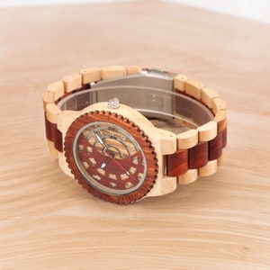 Men wooden watch with hollow gear dial and full wood wristband, featuring a casual design and secure folding clasp.