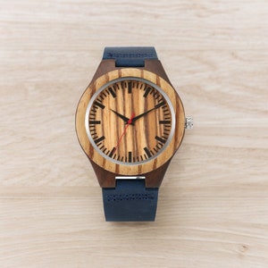 Classic zebra wood men watch featuring a quartz movement, a striking red seconds hand, and a blue genuine leather strap. Ideal for a sophisticated and unique style.