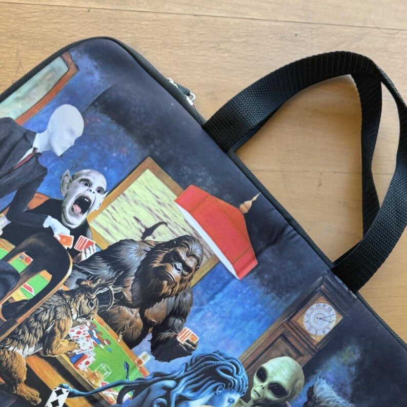 Close up cryptid creatures playing poker laptop bag