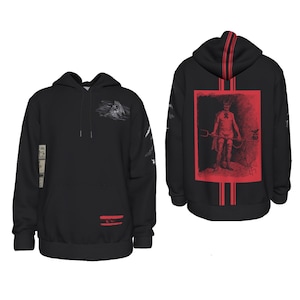 May include: Black hooded sweatshirt with a white graphic print on the front and a red graphic print on the back. The back print features a figure holding a pitchfork and a red background.