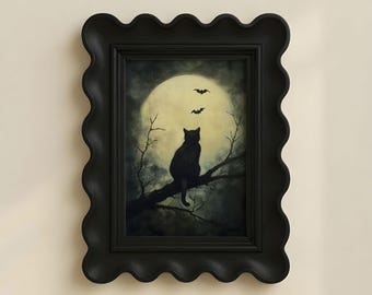 May include: A framed wall art piece featuring a black cat sitting on a tree branch against a large, glowing full moon. Two small black bats fly in the sky above the cat. The artwork is enclosed in a black, wavy-edged, scalloped picture frame.