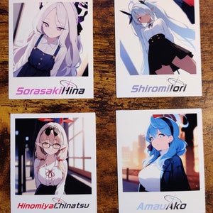 May include: Four polaroid-style photos of anime characters. The top left photo shows a girl with long purple hair wearing a white shirt and blue overalls. The top right photo shows a girl with long white hair wearing a white shirt and black skirt. The bottom left photo shows a girl with long blonde hair wearing a white shirt and black skirt. The bottom right photo shows a girl with long blue hair wearing a white shirt and blue jacket.