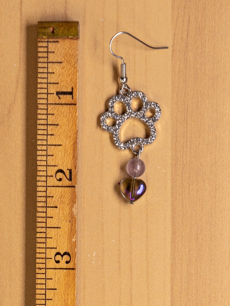 Paw print earrings is approximately 2.25 inches in length.