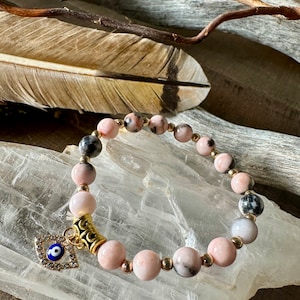 mystical-radiance-all-seeing-eye-healing-properties-charm-bracelet