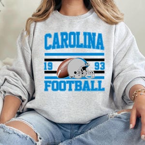 Vintage Carolina Football Sweatshirt T-Shirt And Hoodie, Trendy Carolina Football Fan Gift, Carolina Game Day Shirt, Panther Hoodie
