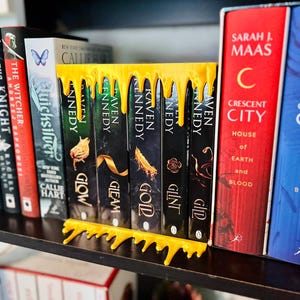 Droppande överhäng Guld, Blod, Alien Goo Hylldekor Bokhylledekor Topp- och bottenhyllset