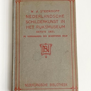 May include: A vintage book with a gray cover and red text. The title reads "NEDERLANDSCHE SCHILDERKUNST IN HET RIJKSMUSEUM" by W. J. Steenhoff. The book is part of the "NEDERLANDSCHE BIBLIOTHEEK" series. The cover has a decorative red border.