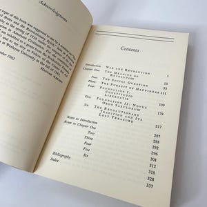 May include: An open book showing the Acknowledgments page on the left and the Contents page on the right. The Contents list chapters including War and Revolution, The Social Question, The Pursuit of Happiness, and Foundation I and II, with page numbers.