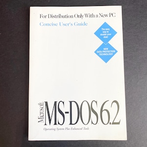 May include: A white booklet titled "For Distribution Only With a New PC Concise User's Guide." The cover features the text "MS-DOS 6.2 Operating System Plus Enhanced Tools" and two blue diamond-shaped graphics with white text.