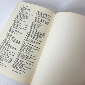 May include: An open book showing page 344, which contains an alphabetical index of historical terms and names printed in black ink on off-white paper. The left page features columns of text, while the right page is blank and cream-colored.