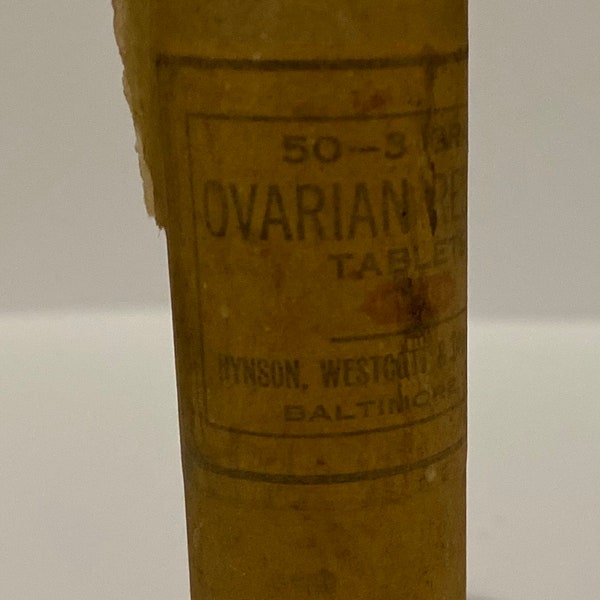 Early HYNSON Westcott Dunning ovarian residue vintage antique medicine bottle with label and partial wrap.   C 1900