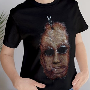 スキンド・フェイス レザーフェイス エド・ゲイン ユニセックス Tシャツ