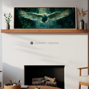 May include: A framed canvas print of a white eagle with its wings spread wide, flying through a dark green and blue forest. The eagle is in focus, and the background is blurred.