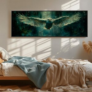 May include: A canvas print featuring a majestic eagle with outstretched wings, soaring through a dark green and blue forest scene. The eagle's feathers are detailed and realistic, with a soft, watercolor-like effect.