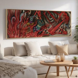 May include: A framed artwork depicting a dramatic scene with figures and fiery red elements. The artwork features a gold frame and is displayed above a white sofa with neutral-colored pillows. The overall aesthetic is a blend of traditional and modern styles.