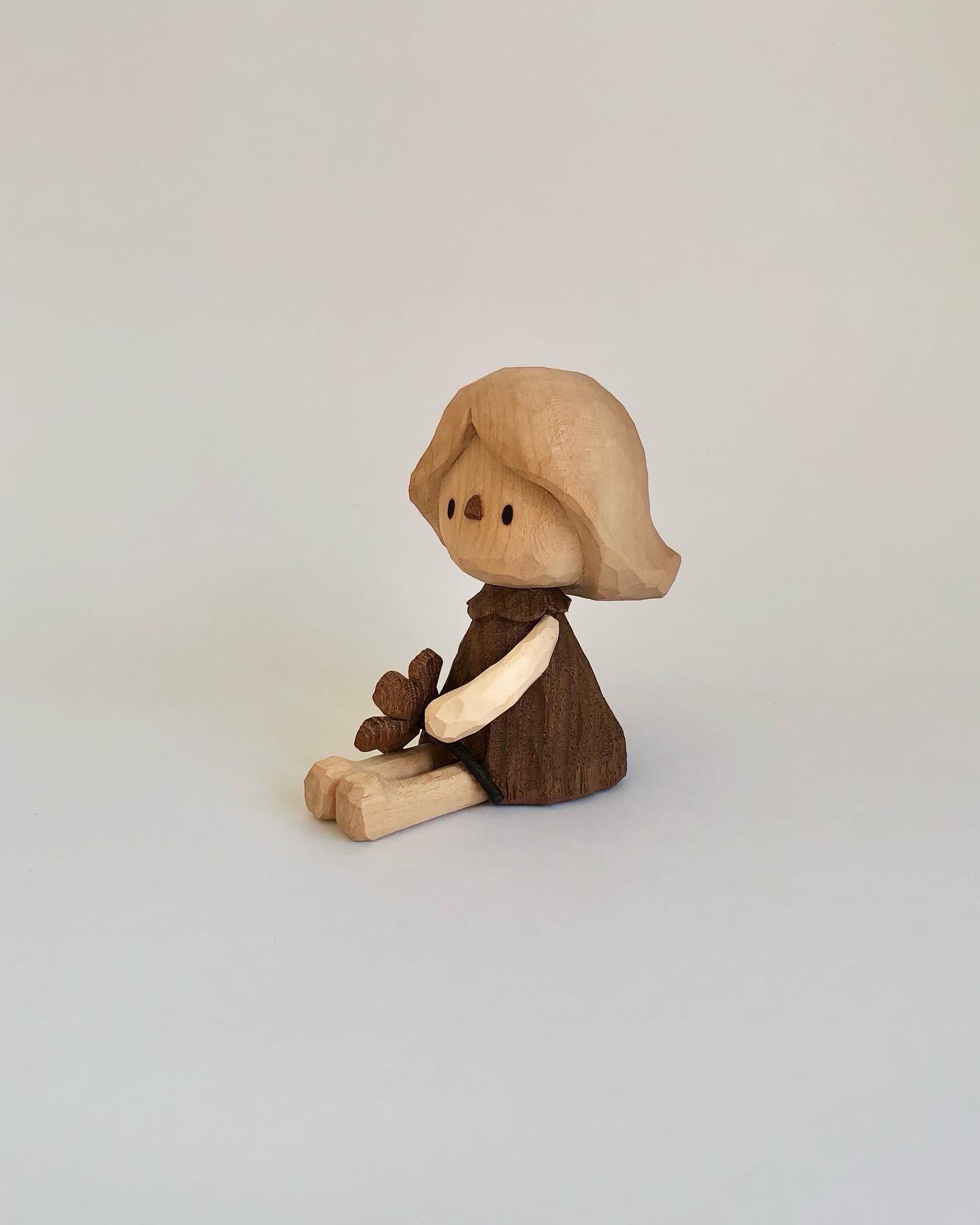 Handmade, wooden carved,  The Lazy Little One Holding a Flower