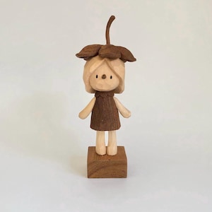 Handmade, wooden carved,  The one crowned with flowers