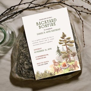 Printed CozyPines Backyard bonfire party invitation on high-quality cardstock, highlighting the cozy and warm design.