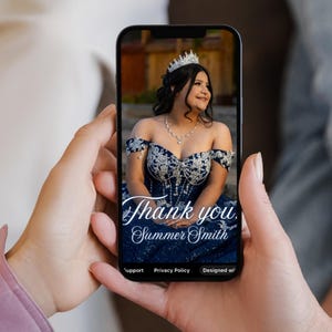 May include: A smartphone displays a photo of a woman in a formal gown and tiara. The navy blue dress has silver embellishments. The text "Thank you, Summer Smith" is written in elegant script across the image.
