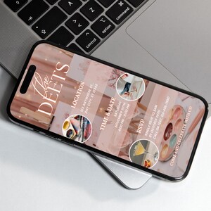 May include: A smartphone displays an event invitation with a pink and white marble design. The invitation includes the text "The DEETS", location, time, date, and RSVP information. The phone rests on a laptop.